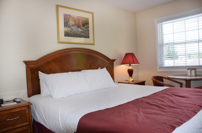 King Bed with Table and cordless blinds
